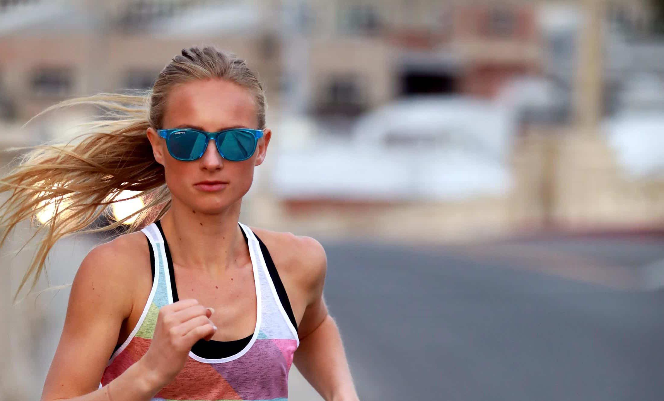 Woman wearing designer sport sunglasses from Bristol