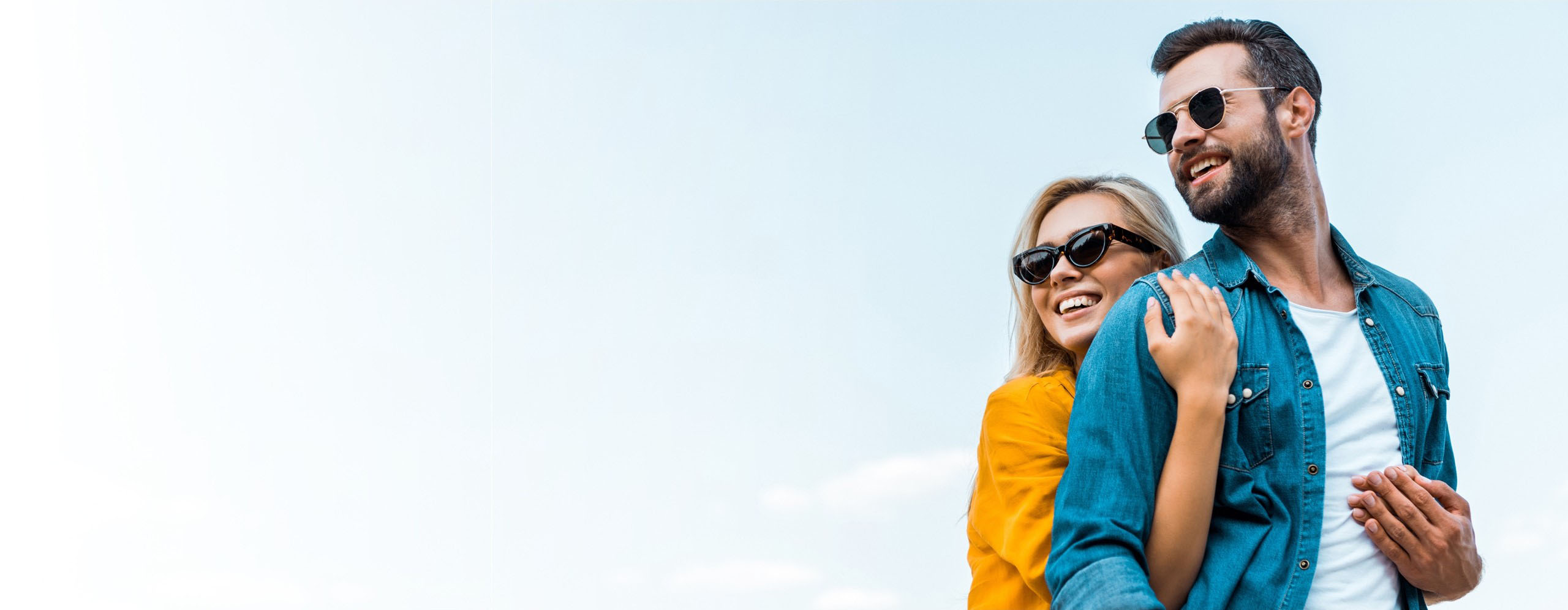 Man and woman wearing designer sunglasses from Bristol